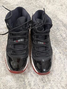 Nike Black/Red High-Top Basketball Sneakers 

Air Jordan Retro 11